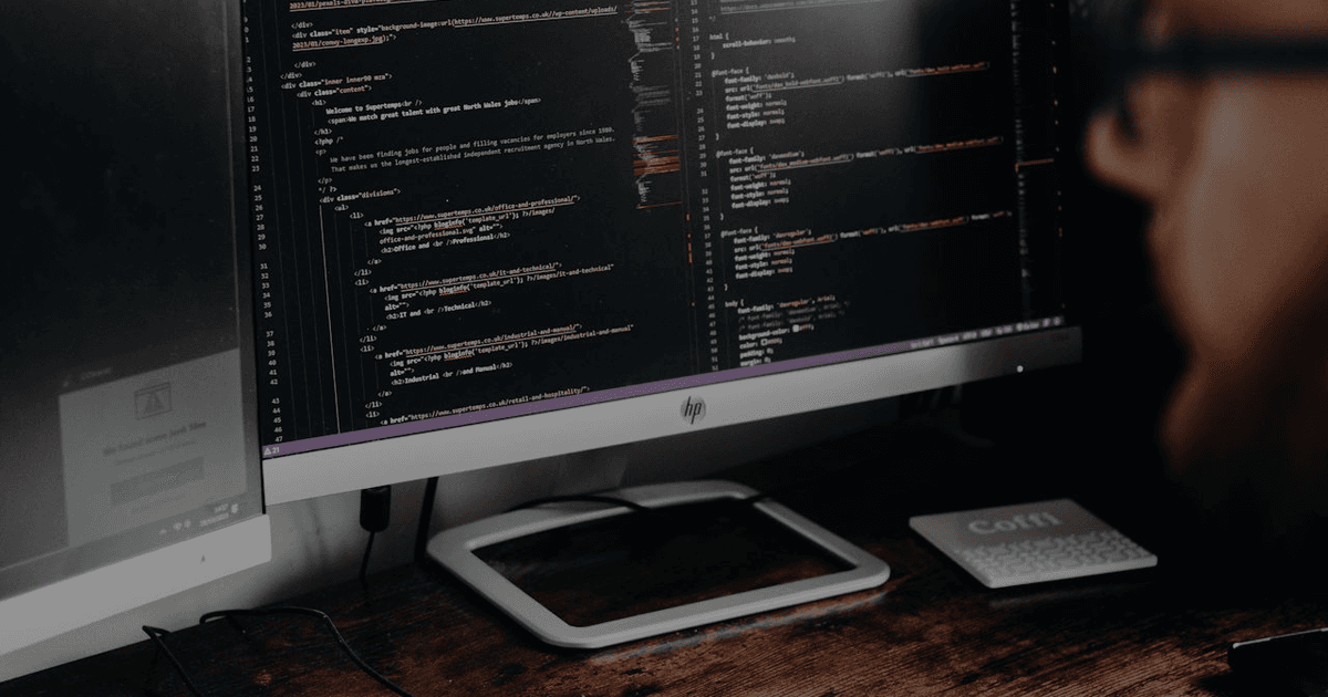 Developer building an API integration with AI model connection diagram on screen